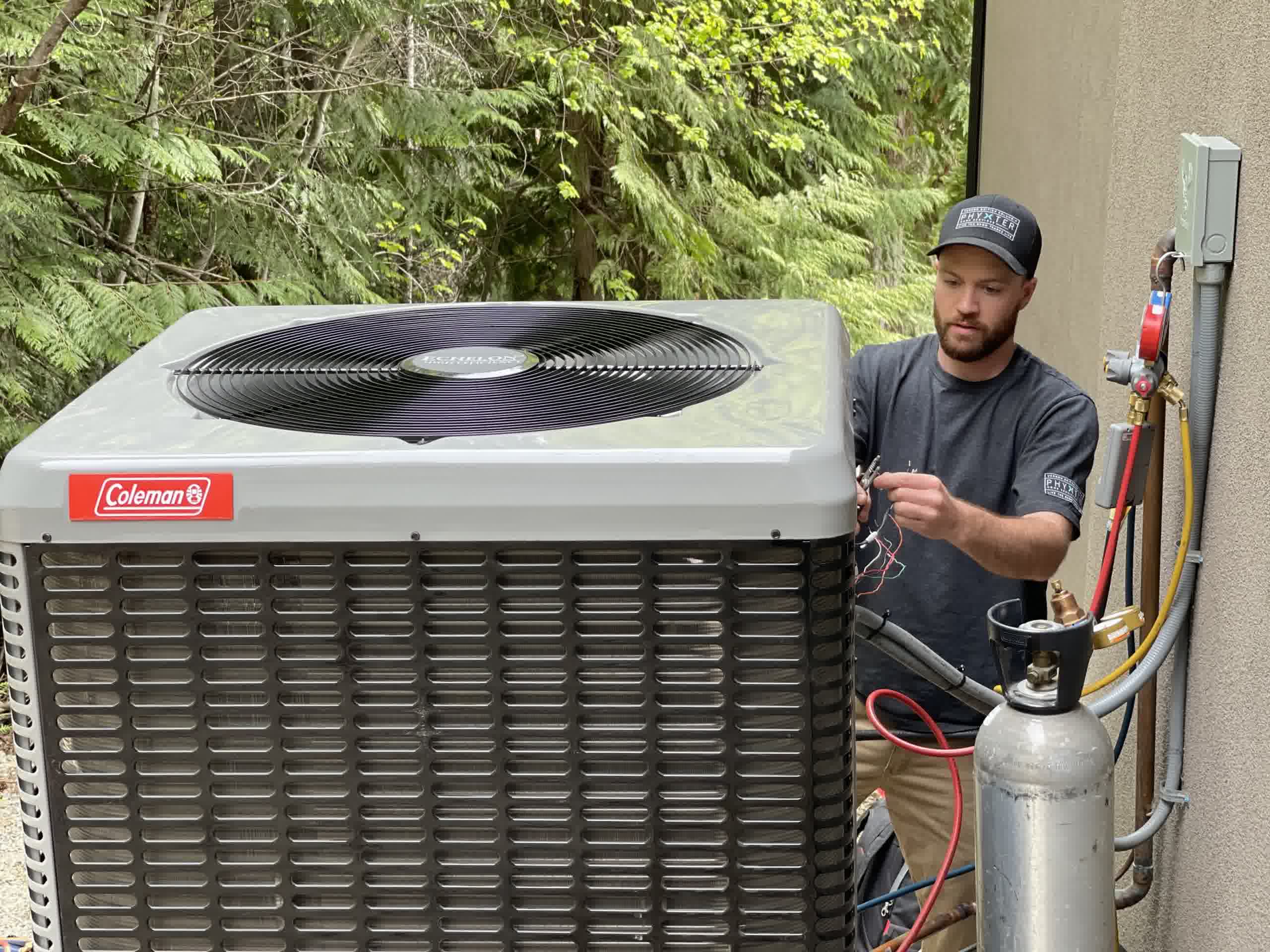 ambient cooling heating crofton Heat Pump Repair and Replacement A Step by Step Guide - Ambient Cooling & Heating A man inspecting his outdoor heat pump